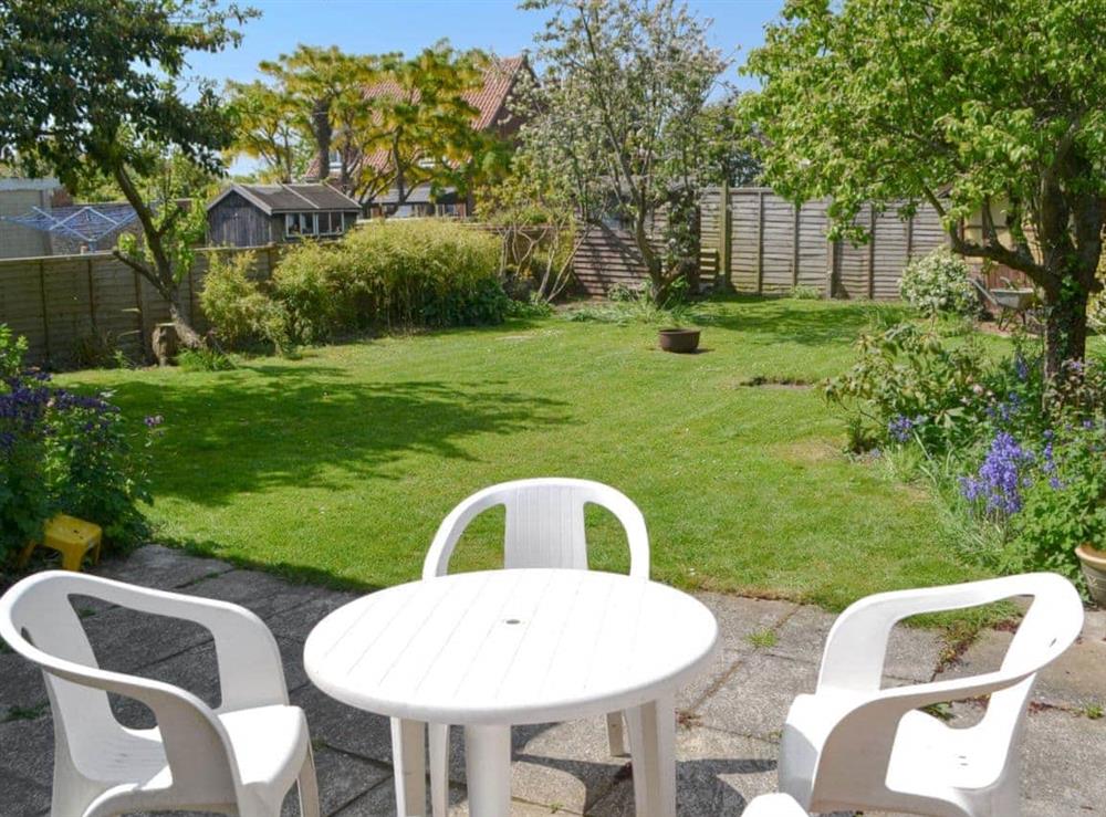 Delightful sitting out area in the garden at The Paddock in Happisburgh, Norfolk