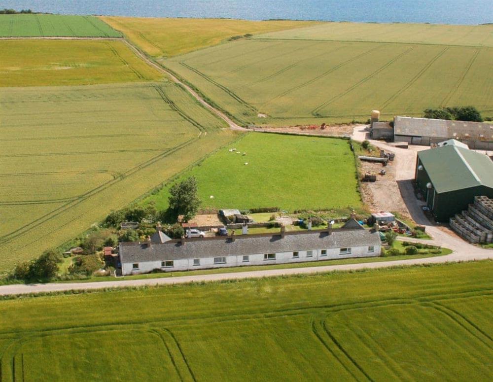 Aerial photo showing the surrounding countryside and the property’s proximity to the coast at The Paddock in Portmahomack, near Tain, Ross-Shire