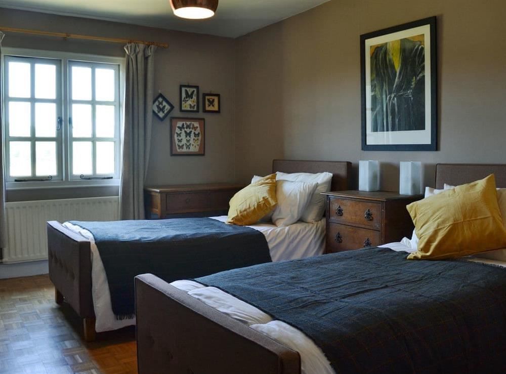 Charming twin bedroom at The Paint Box in Heasley Mill, near South Molton, Devon