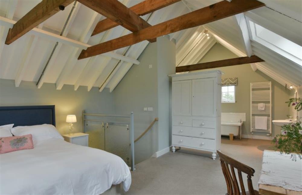 Open-plan bedroom with 5’ king-size bed and en-suite bathroom area (photo 2) at The Parlour, Freston