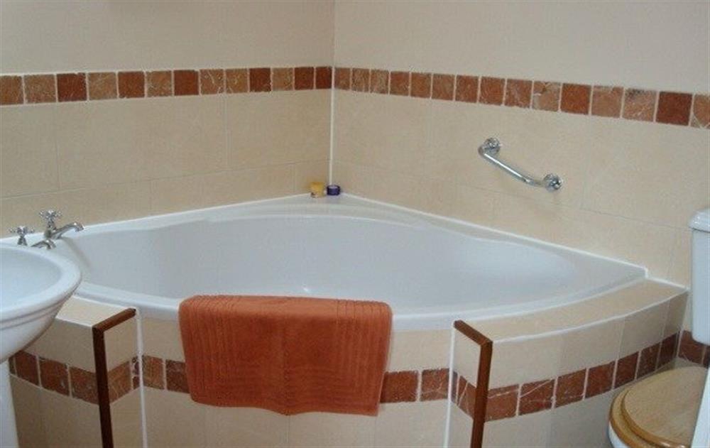 First floor:  En-suite to master bedroom with corner bath at The Parlour, Navan
