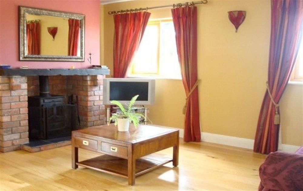 Ground floor:  Spacious sitting room with multi-fuel stove at The Parlour, Navan