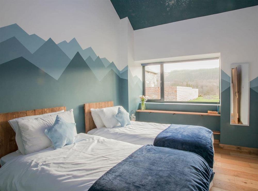 Pretty twin bedded room at The Pendre Longbarn in Pontrhydygroes, near Ystrad Meurig, Cardigan, Dyfed