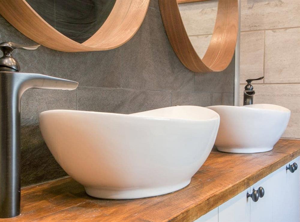 Wonderful en-suite with dual washbasins in a contemporary setting