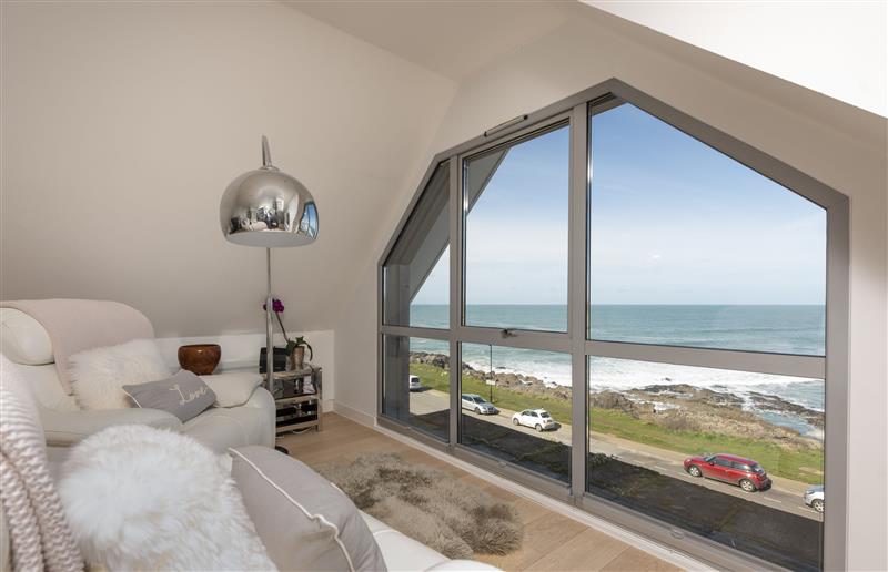 Relax in the living area at The Penthouse Fistral Beach, Cornwall
