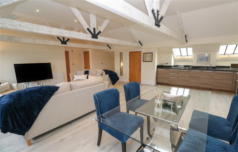 Relax in the living area at The Penthouse, Helston