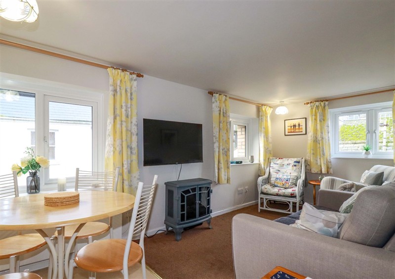 Relax in the living area at The Penthouse, Looe