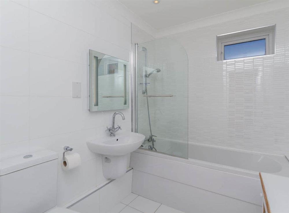Family bathroom with shower over bath at The Penthouse in Strone, near Dunoon, Argyll