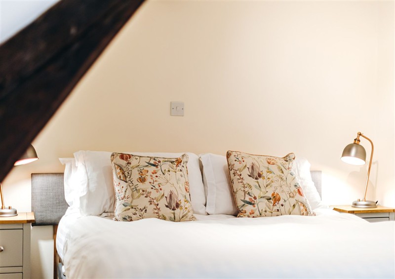 One of the bedrooms at The Pheasant Apartment, Neenton