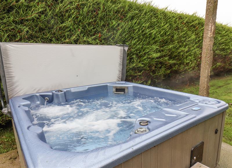 Enjoy the hot tub at The Pheasantry, Flamborough