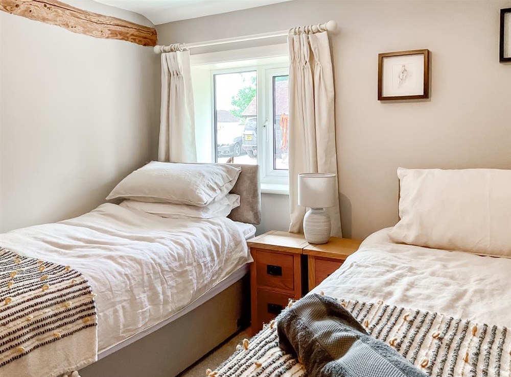 Twin bedroom at The Piggary in Cadnam, near Brockenhurst, Hampshire