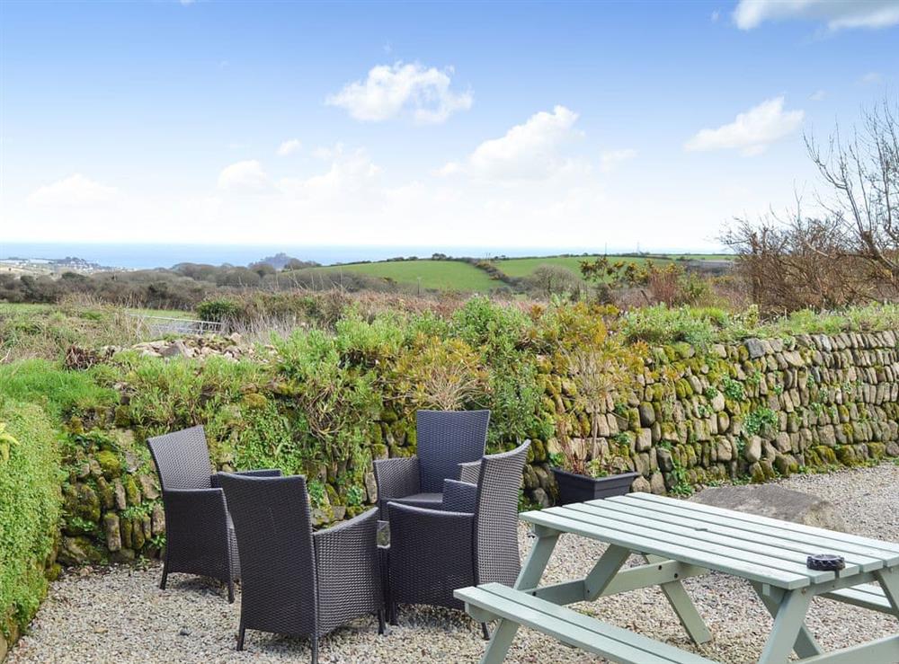 Siting out area with sea views at The Piggery in Ludgvan, near Penzance, Cornwall, England