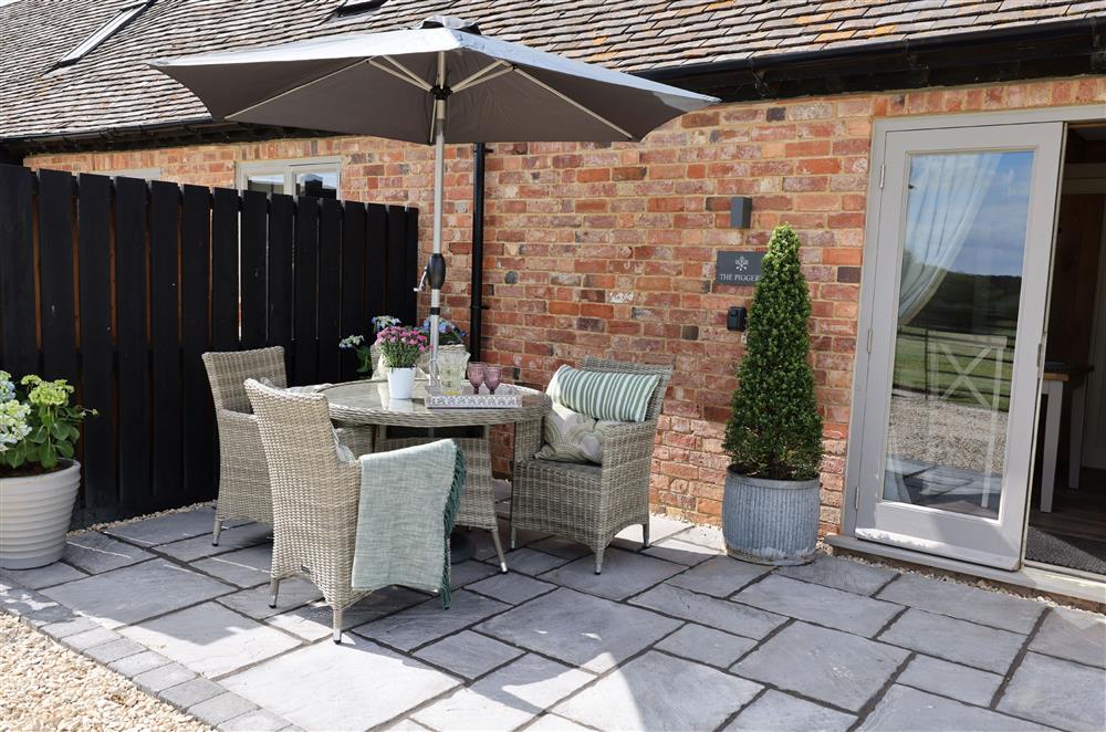 Sit and enjoy a morning coffee from the patio area  at The Piggery, Walton, Near Stratford-upon-Avon