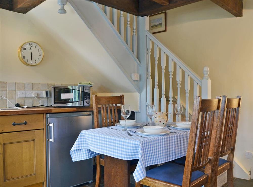 Characterful kitchen/dining area (photo 2) at The Pigsty Cottage in Oswestry, Shropshire