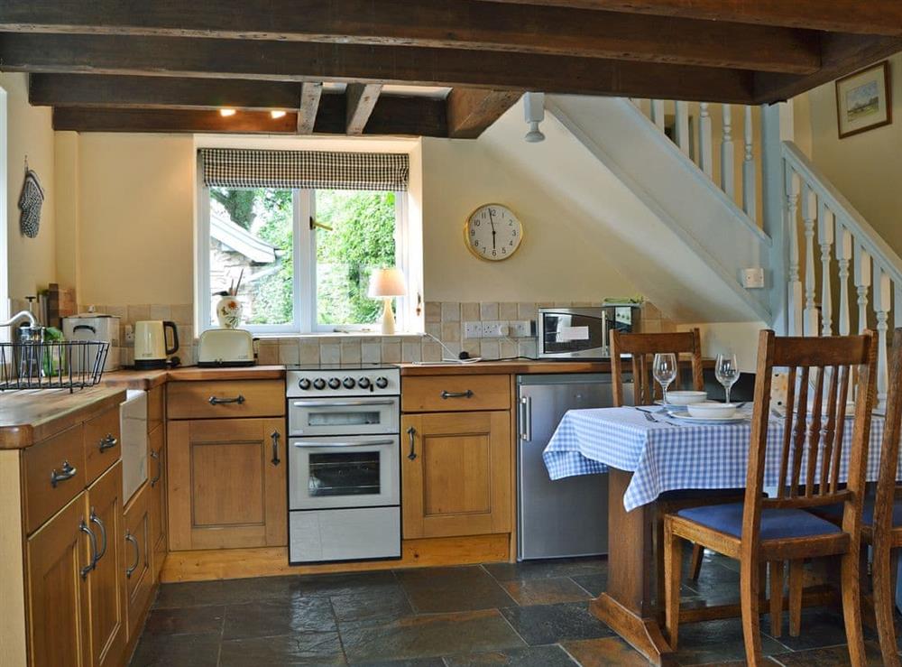 Characterful kitchen/dining area at The Pigsty Cottage in Oswestry, Shropshire
