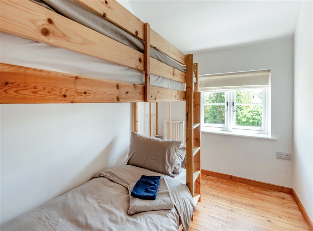 Bunk bedroom at The Pink Cottage in Bottisham, Cambridgeshire