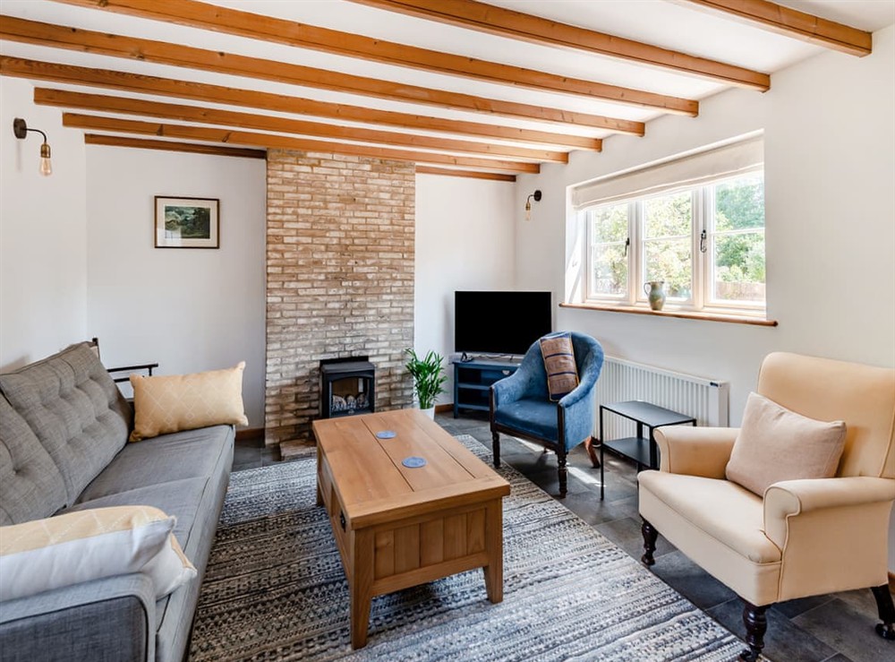 Living room at The Pink Cottage in Bottisham, Cambridgeshire