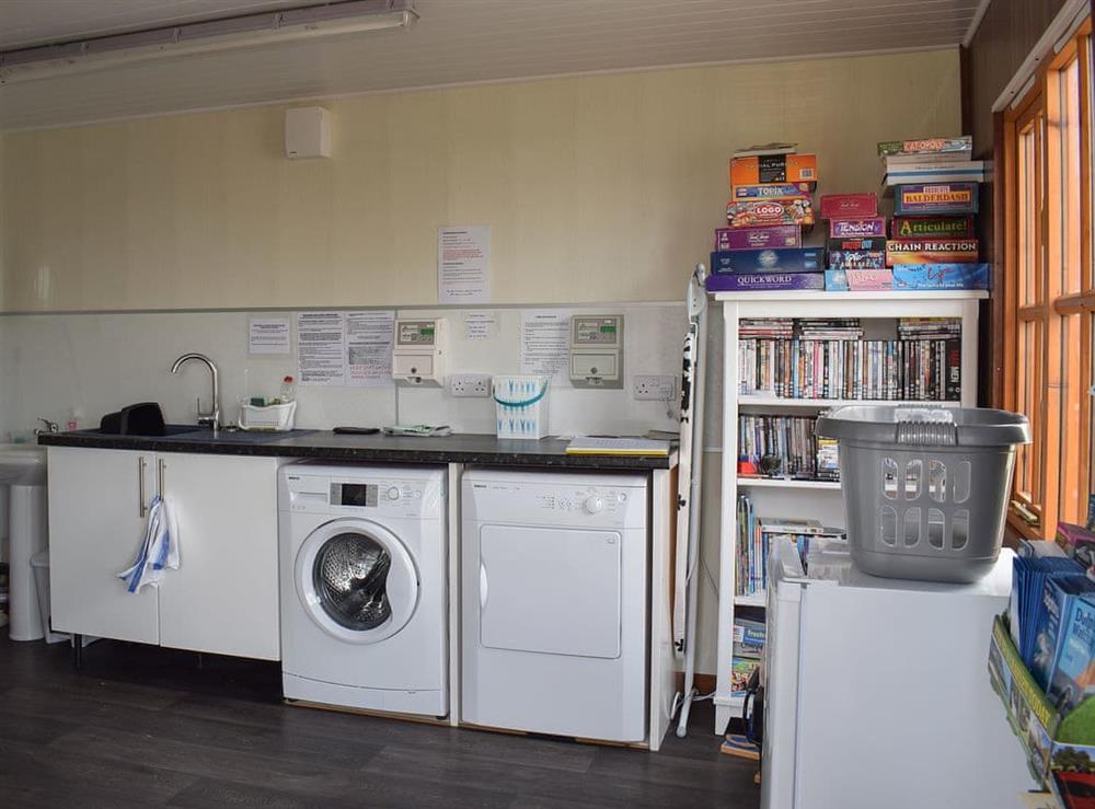 Shared utility room with laundry facilities at The Plucking Barn in Llanwnnen, near Lampeter, Cardigan, Dyfed
