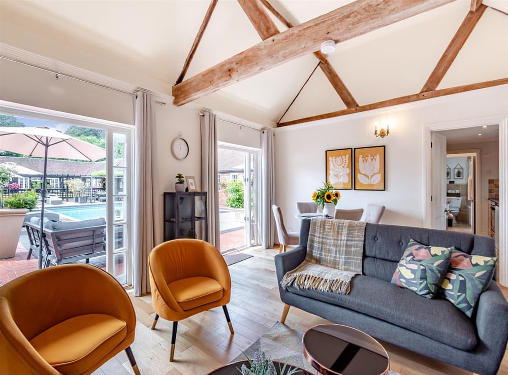 Living room/dining room at The Pool House in Woking, near Guildford, Surrey
