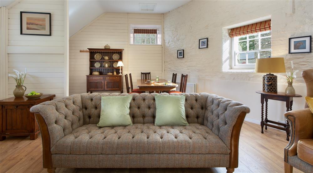 The sitting and dining room (photo 2) at The Potter's Cottage in Strangford, Downpatrick