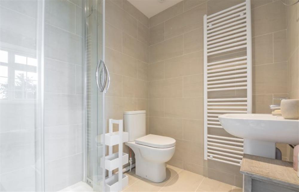 First floor: En-suite to the master bedroom with corner shower, wash basin, WC and heated towel rail at The Potting Shed and Bothy, Ringstead near Hunstanton