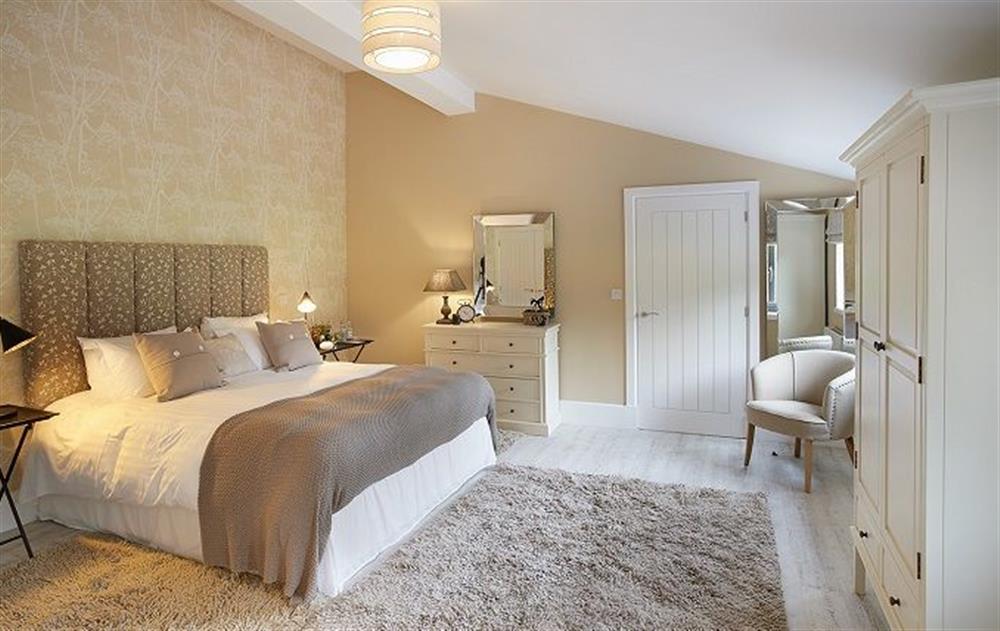 Spacious bedroom with 6’ double bed at The Potting Shed, Weston-under-Lizard, Shifnal 