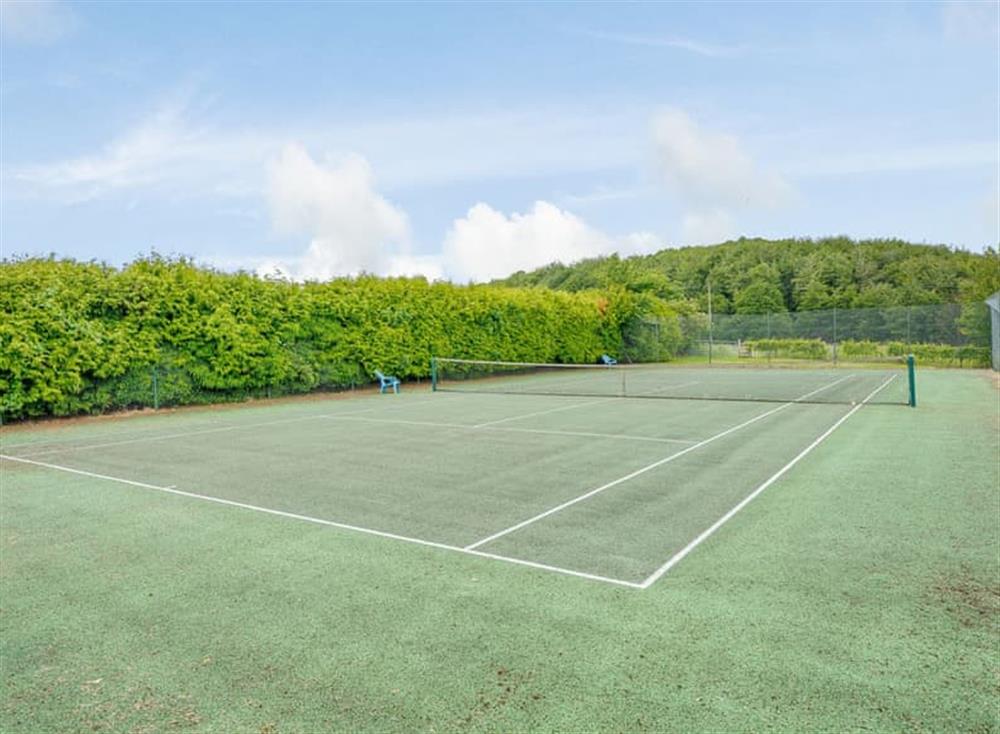 All weather tennis court at The Poultiggery in Ross on Wye, England