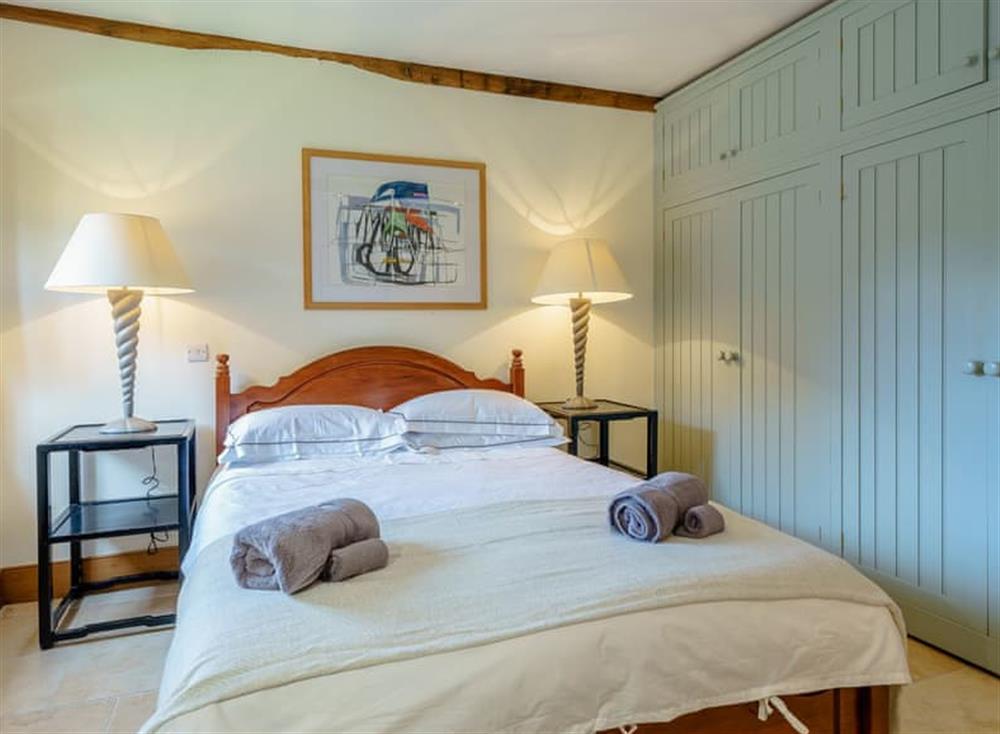 Ample built-in storage within the double bedroom at The Poultiggery in Ross on Wye, England
