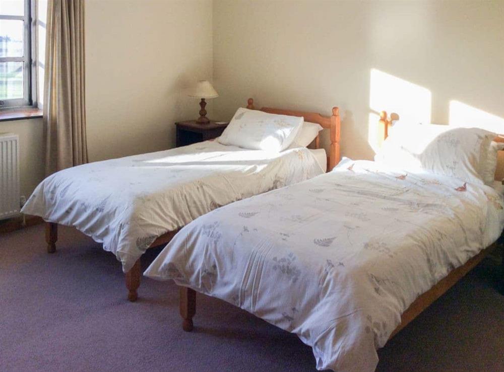 Delightful twin bedroom at The Pump House in Hawkesbury Upton, Avon