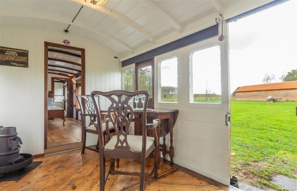 Ground floor: Dining with a view at The Railway Carriage, Melton Constable