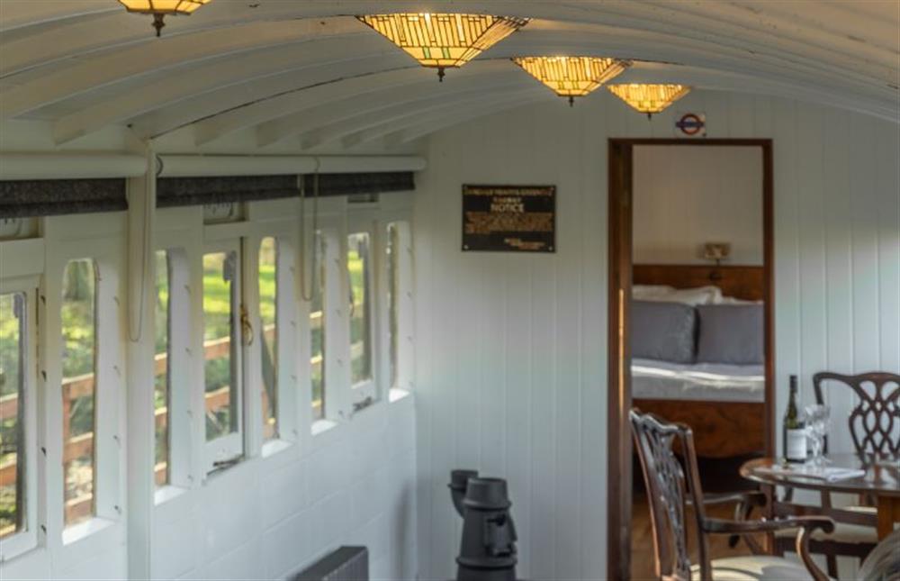 Ground floor: Tiffany lamps light the way at The Railway Carriage, Melton Constable