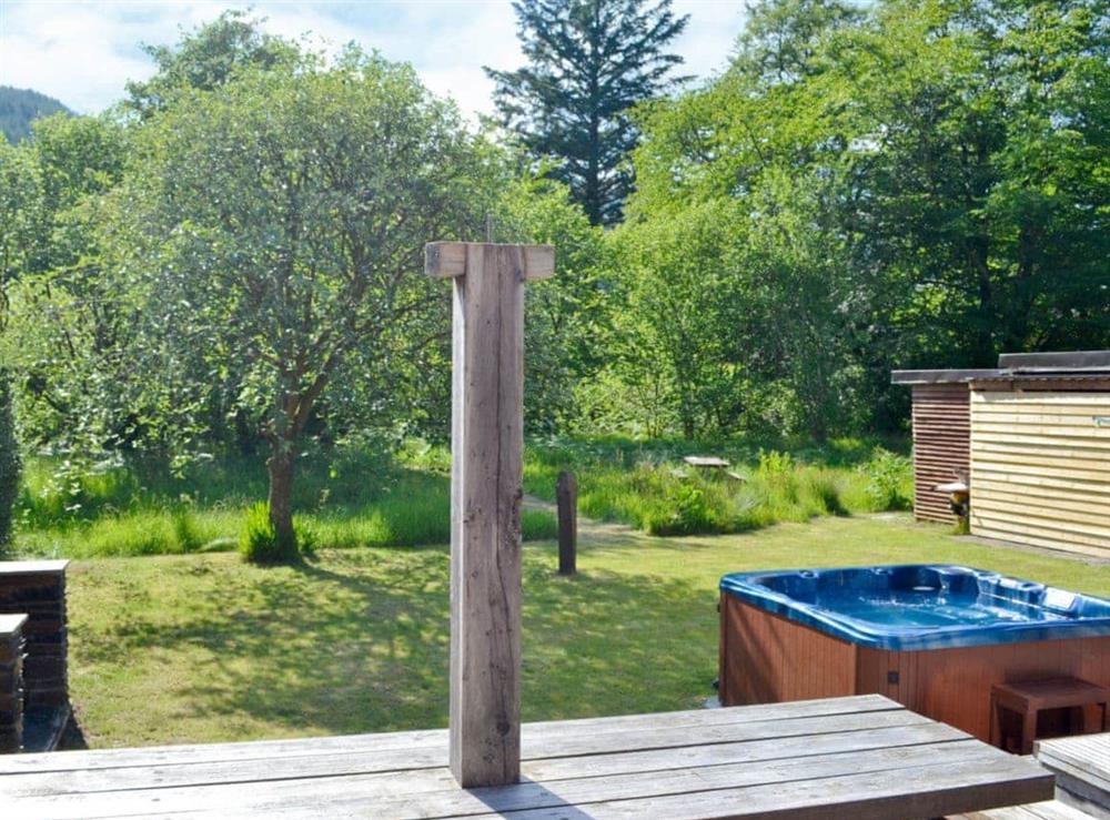 Garden and grounds with hot tub at The Ranch in Glen Massan, near Dunoon, Argyll
