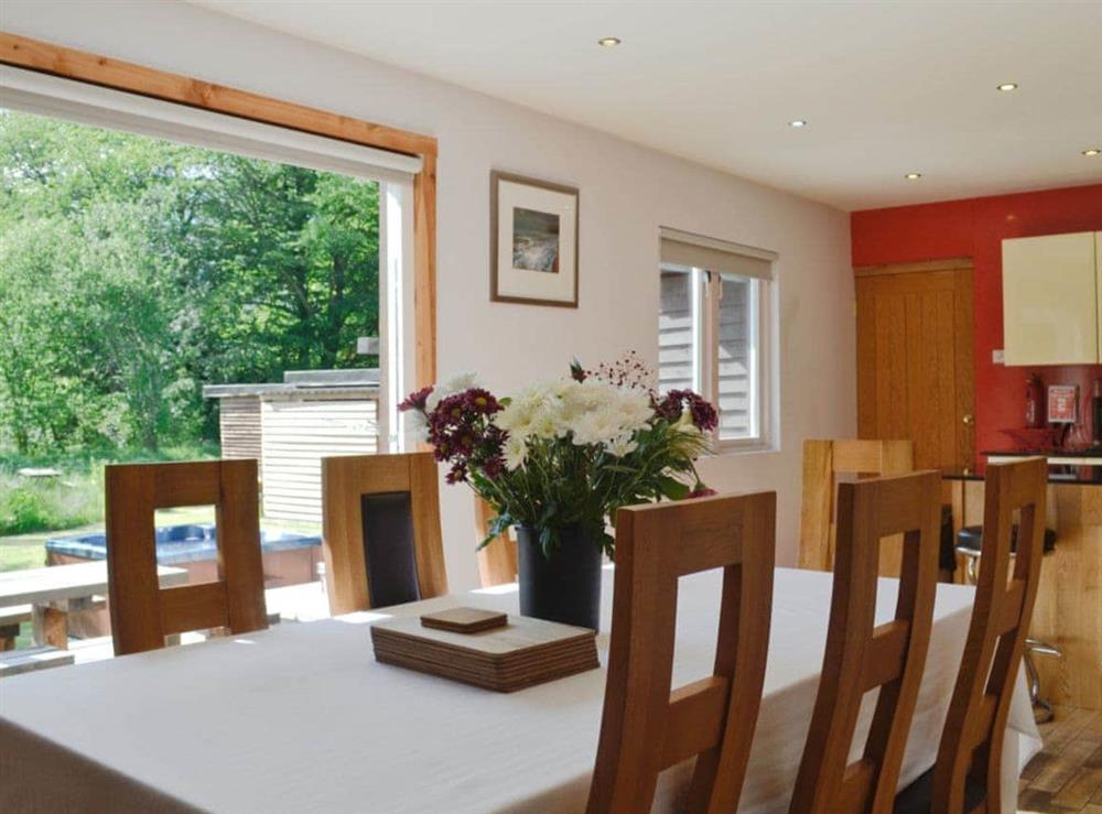 Kitchen/ dining area with doors to the garden at The Ranch in Glen Massan, near Dunoon, Argyll