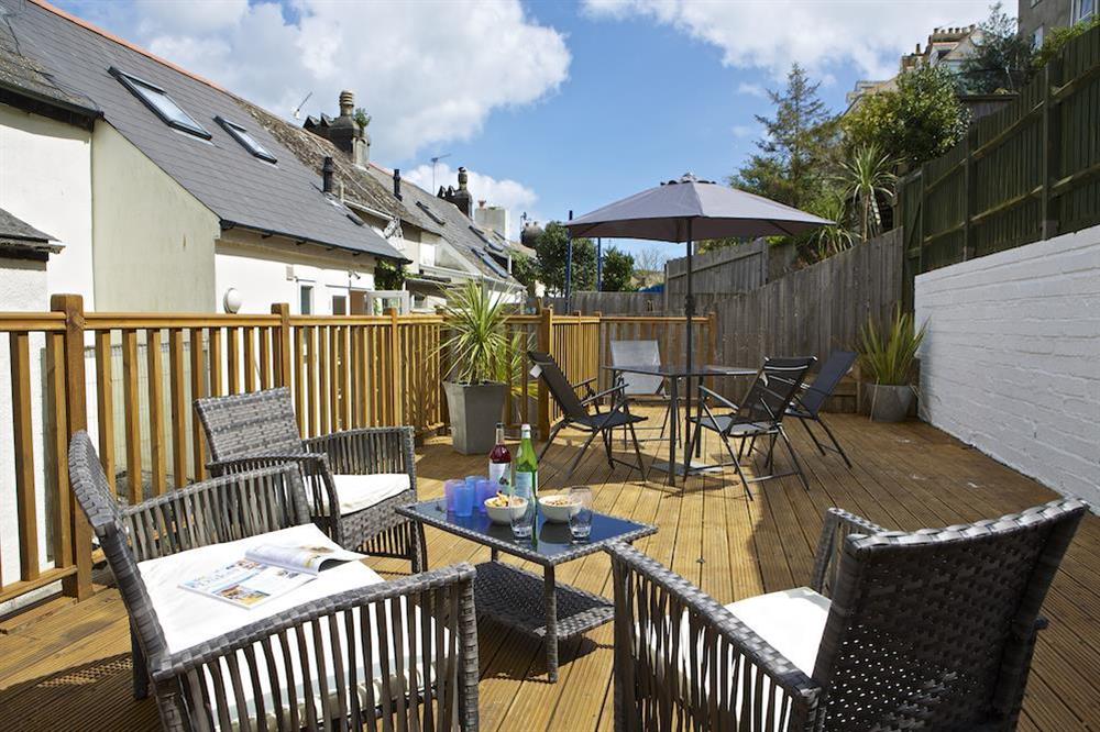 Sundrenched decking area perfect for enjoying sunny days and balmy evenings