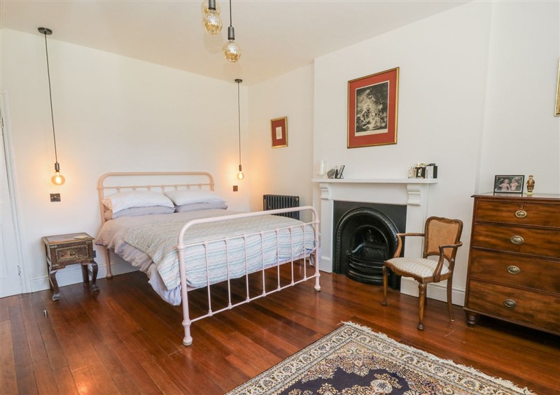 One of the bedrooms at The Retreat at Glanrannell Park House, Llansawel