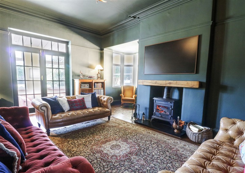 Relax in the living area at The Retreat at Glanrannell Park House, Llansawel