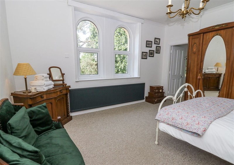 This is a bedroom at The Retreat at Glanrannell Park House, Llansawel