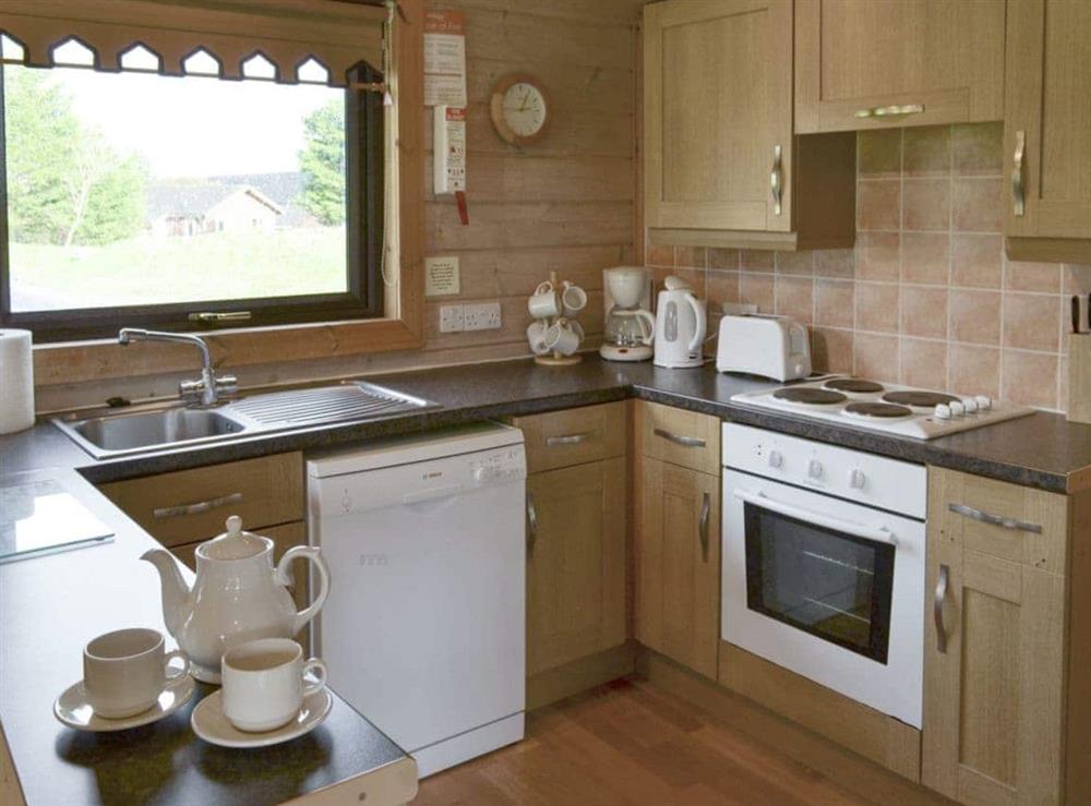 Well-equipped fitted kitchen area at The Retreat in Bideford, near Northam, Devon