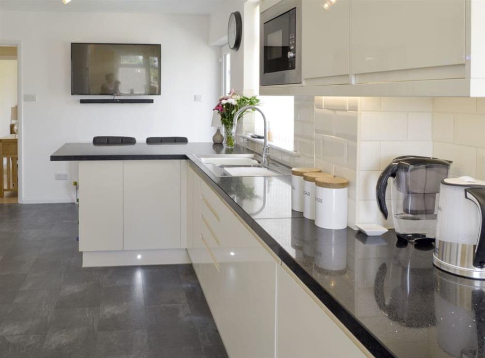 Well-equipped fitted kitchen at The Retreat in Hunmanby, near Filey, North Yorkshire