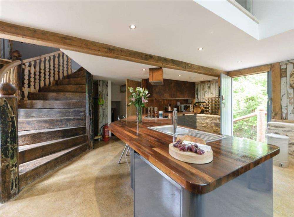 Kitchen & unique wooden staircase at The Retreat in Longhope, near Gloucester, Gloucestershire, England