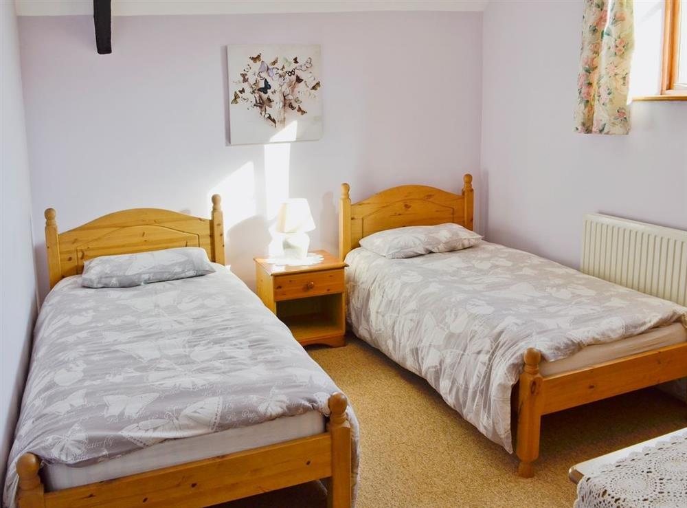 Twin bedroom at The Retreat in Uploders, Bridport, Dorset., Great Britain