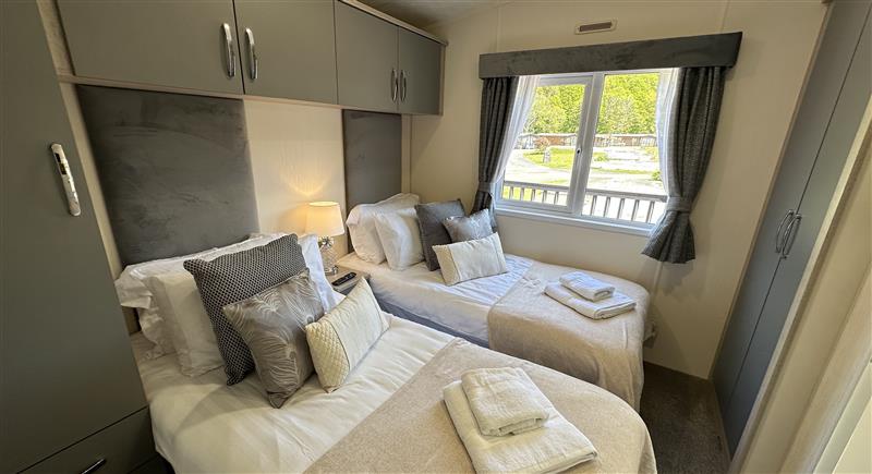 Enjoy the living room at The Ridgeway, Woodlands Lodge Retreat near Llanarth