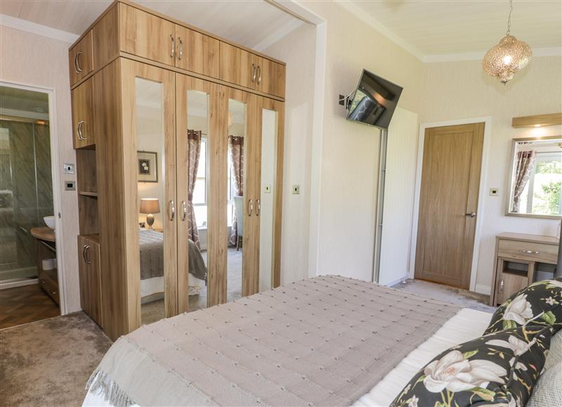 A bedroom in The Rivendale Lodge at The Rivendale Lodge, Pwllheli
