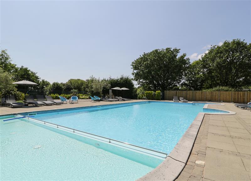 There is a swimming pool (photo 2) at The Rivendale Lodge, Pwllheli