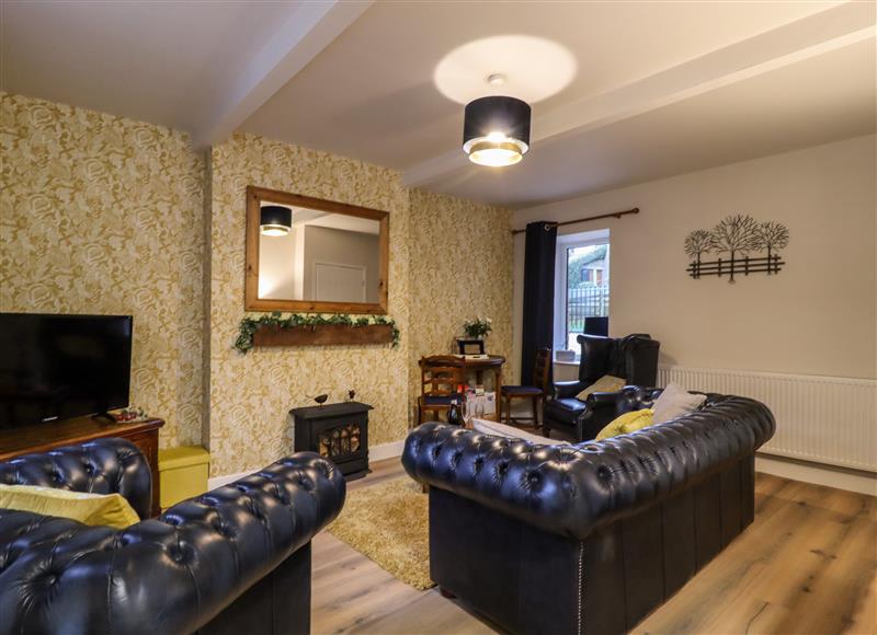 Enjoy the living room at The Robins Holiday Cottage, Haworth