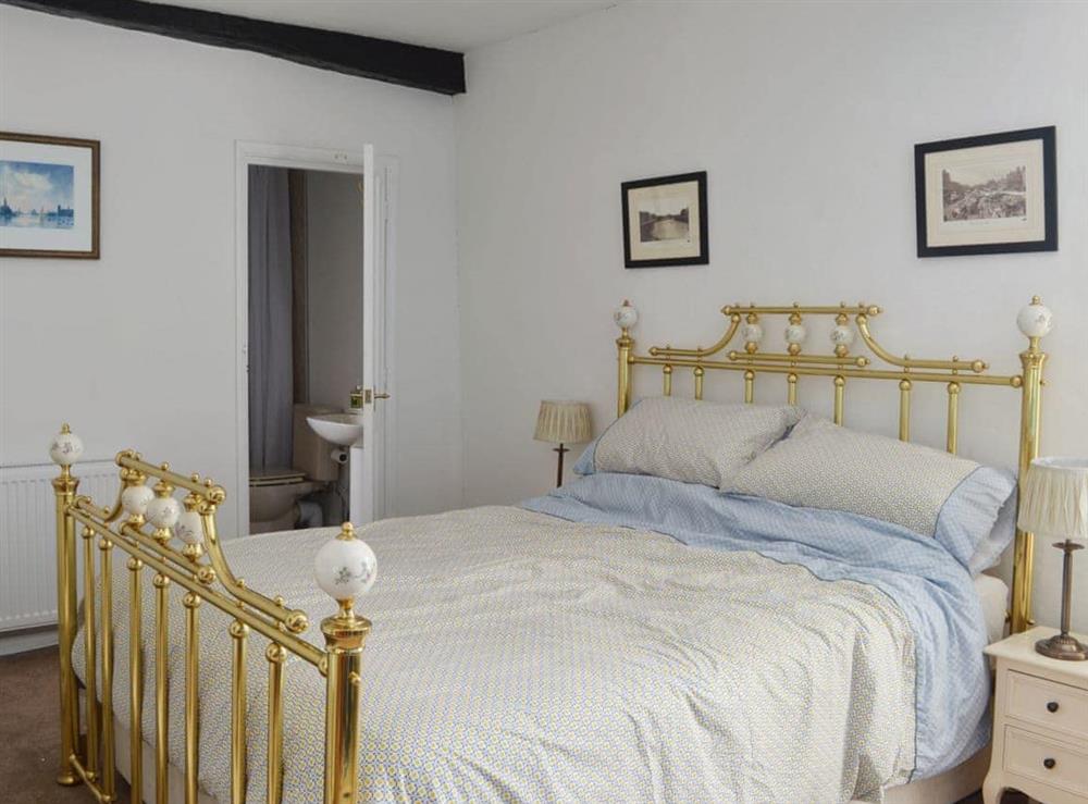 Charming antique-style brass bed