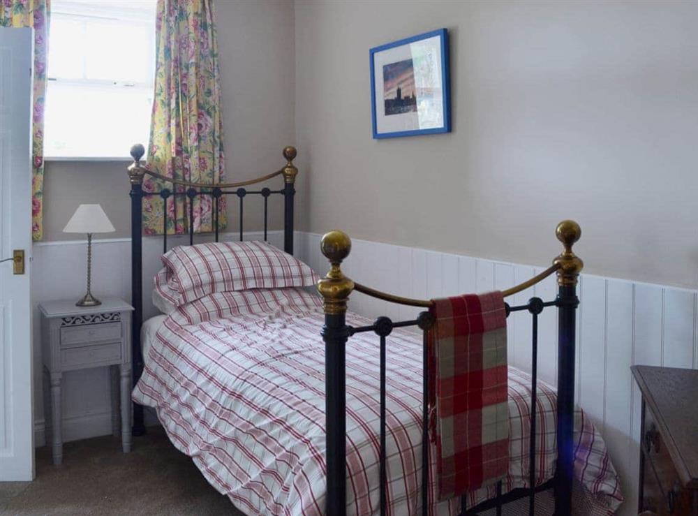 Cosy single bedroom with shared en-suite shower room at The Rockery in Shap, near Penrith, Cumbria