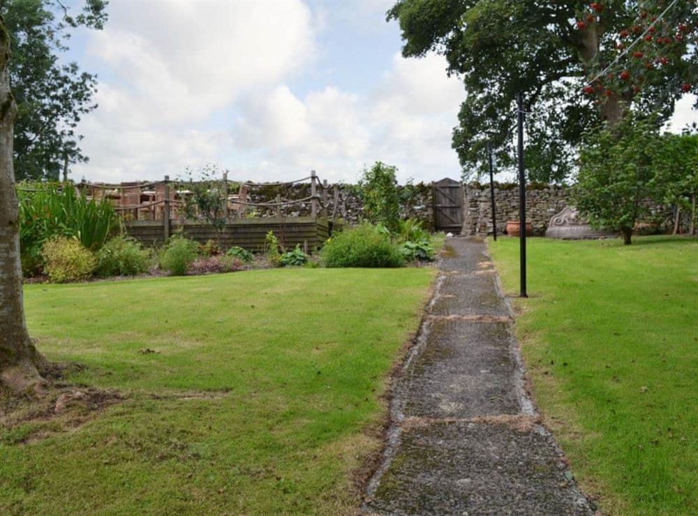 The garden is home to raised decked area with views over the countryside at The Rockery in Shap, near Penrith, Cumbria