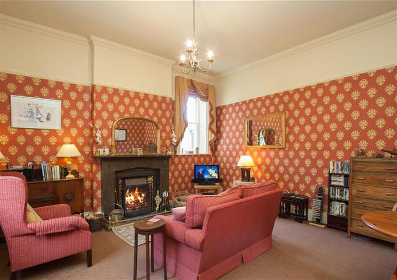 Relax in the living area at The Rockery Suite, Hawkshead