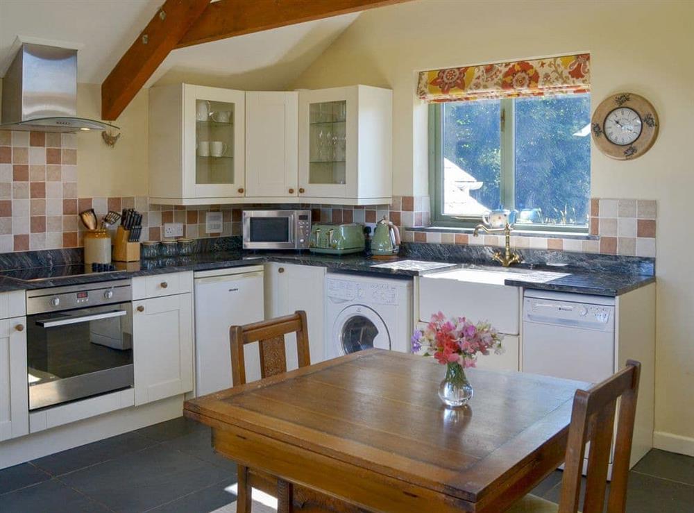 Well equipped kitchen/ dining area at The Roost in St. Breward, near Bodmin, Cornwall